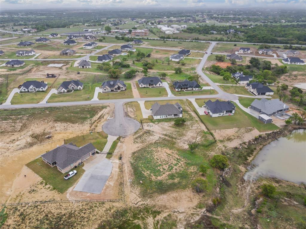 905 Medaris Way Azle, TX 76020 - Photo 11 of 14 an aerial view of residential houses with outdoor space