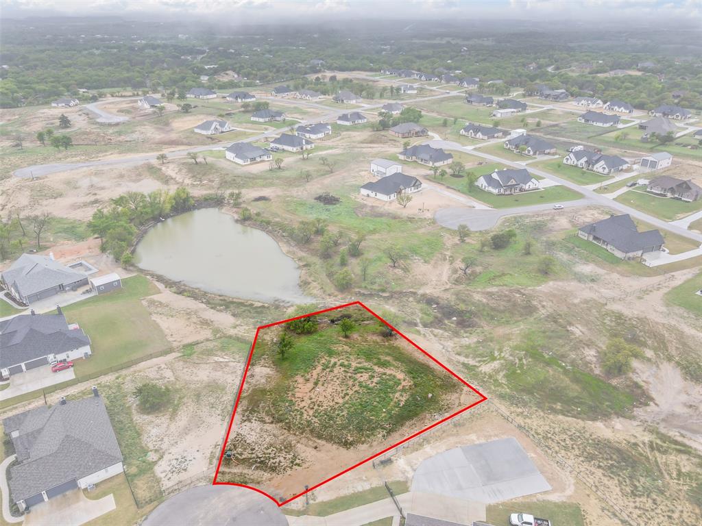 905 Medaris Way Azle, TX 76020 - Photo 2 of 14 a view of a sky from a yard