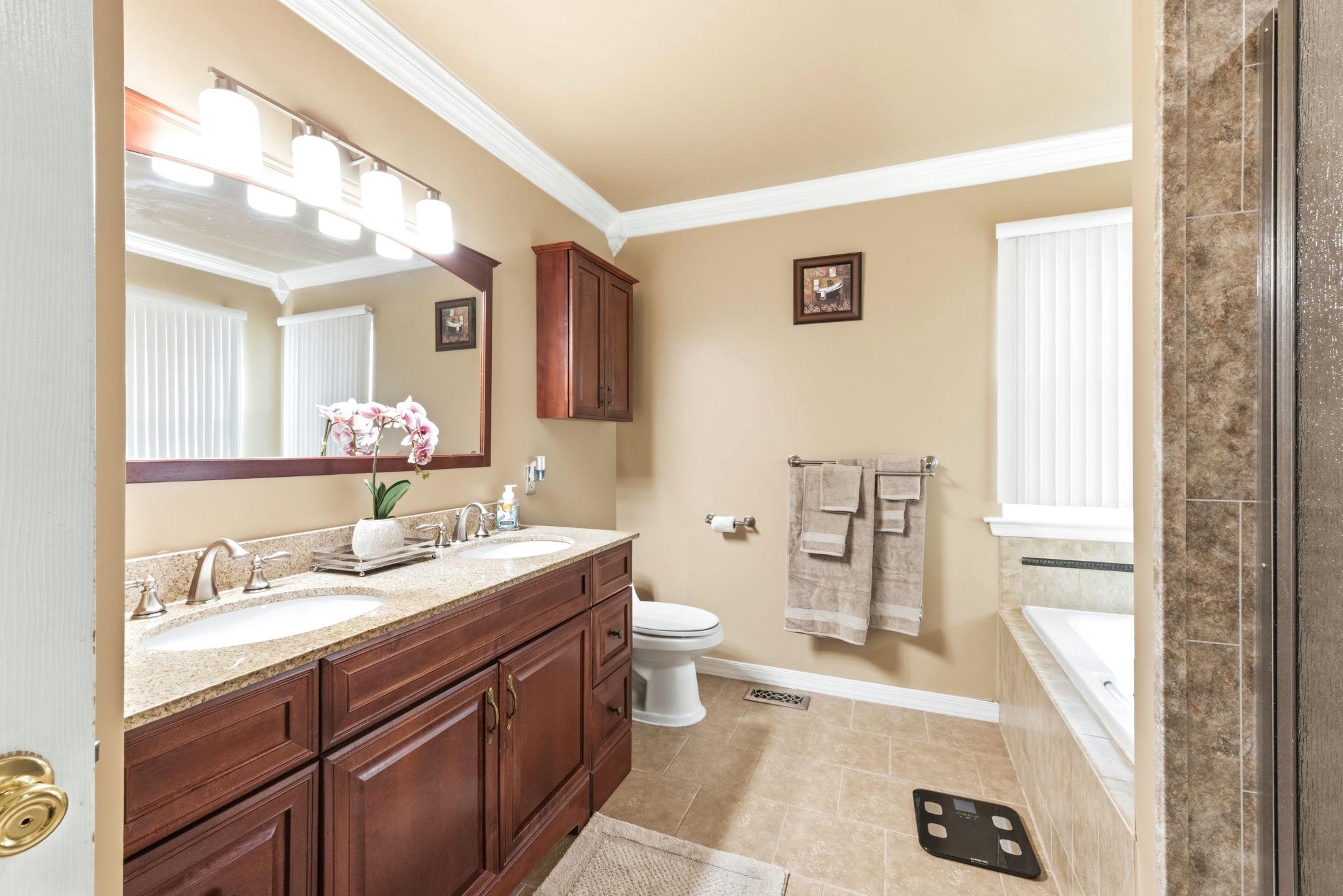 17 Paddock Road Marlton, NJ 08053 - Photo 30 of 54 Elegant primary bathroom with warm tones.