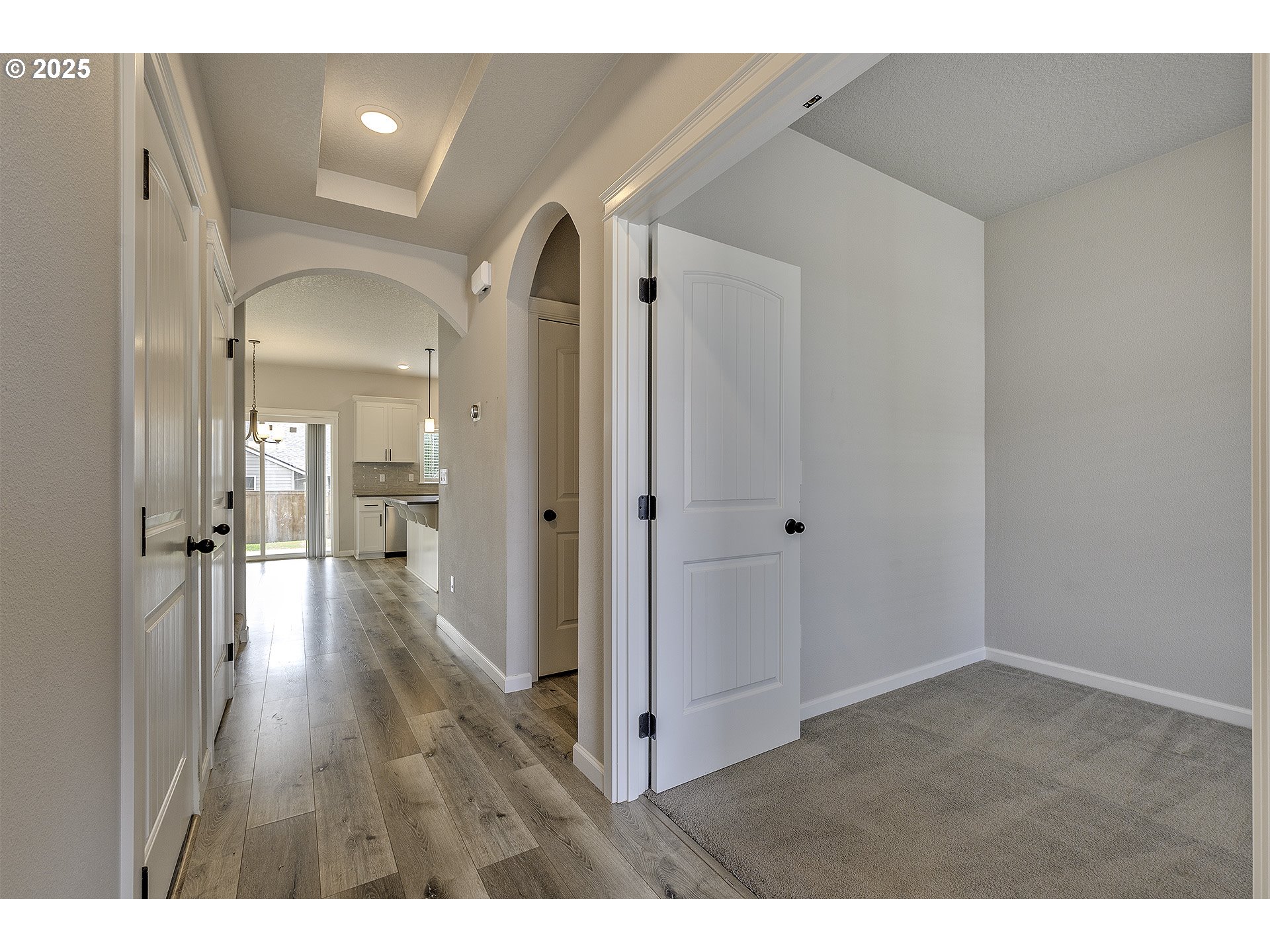 1015 South Nectarine Street Cornelius, OR 97113 - Photo 3 of 36 a view of hallway with wooden floor