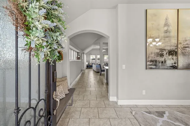 a view of a hallway with entryway