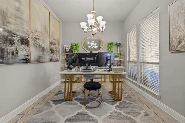 a dining room with fireplace furniture and a window