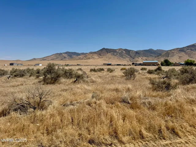 a view of a lake with mountains in the background