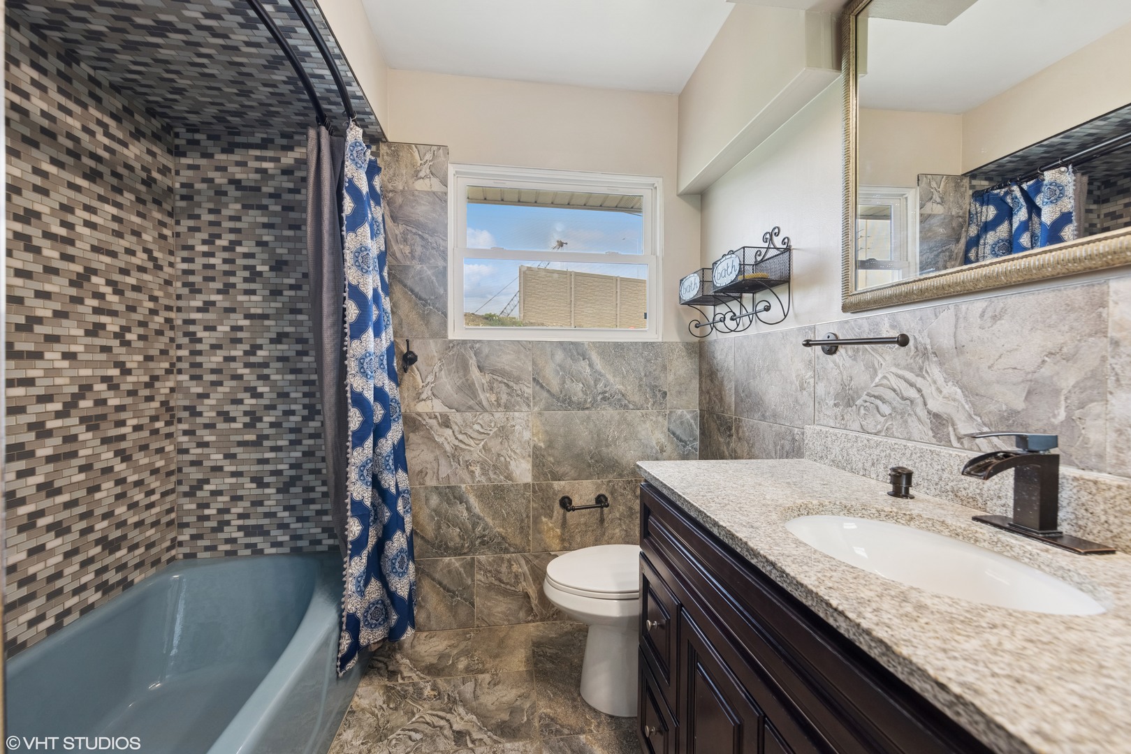 1826 Coolidge Avenue Berkeley, IL 60163 - Photo 15 of 15 a bathroom with a granite countertop sink toilet and shower