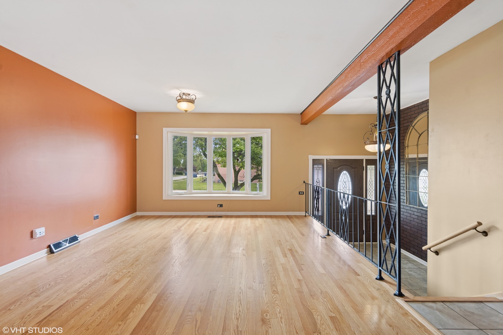 1826 Coolidge Avenue Berkeley, IL 60163 - Photo 4 of 15 a view of empty room with wooden floor and fan