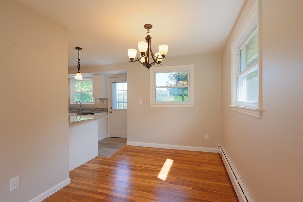1 Alpine Drive West Boylston, MA 01583 - Photo 12 of 26 a view of a room with wooden floor and windows