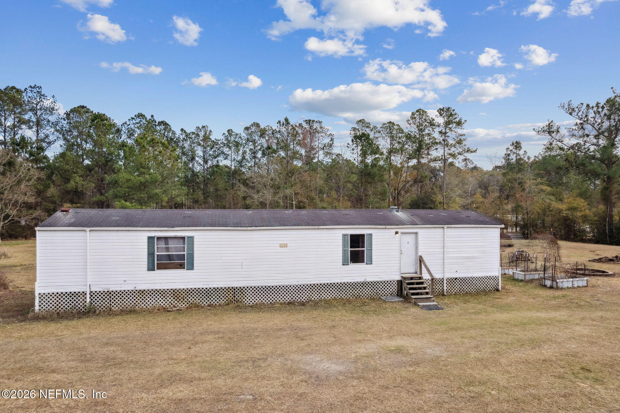 54002 Trooper Court Callahan, FL 32011 - Photo 41 of 56 a view of a backyard