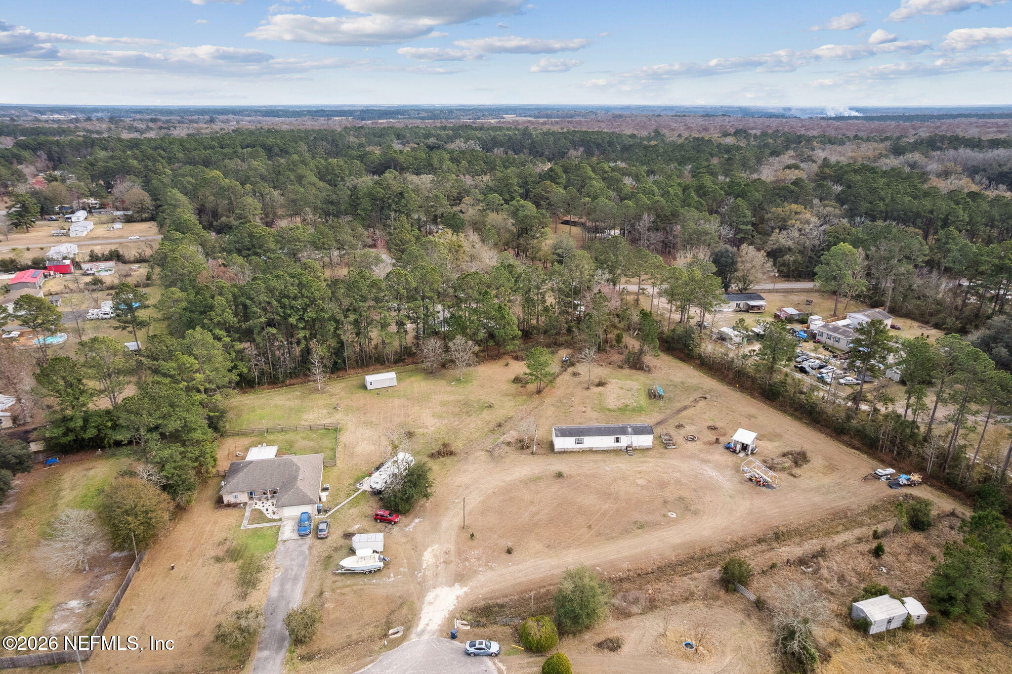 54002 Trooper Court Callahan, FL 32011 - Photo 54 of 56 an aerial view of a city