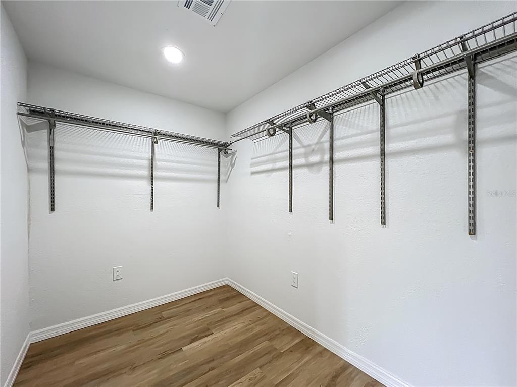 6707 Sierra Terrace New Port Richey, FL 34652 - Photo 24 of 50 a view of a room with racks on the wall