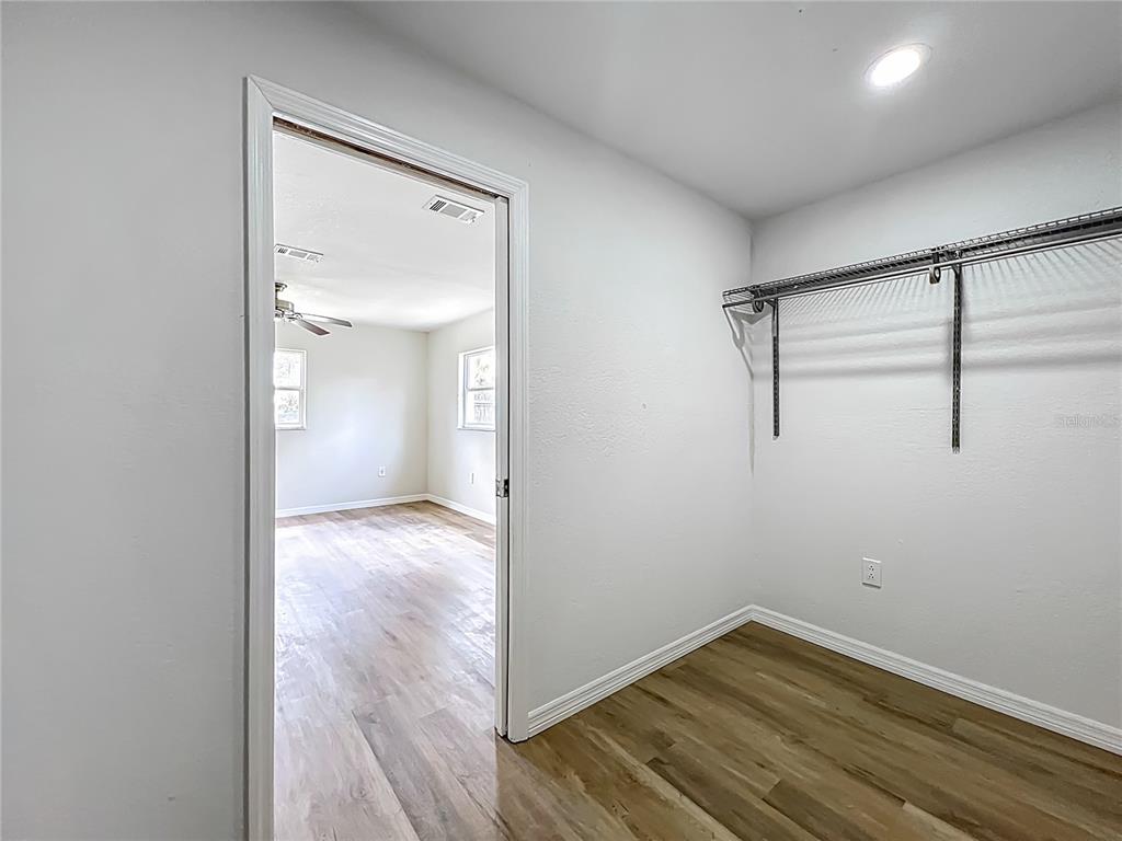 6707 Sierra Terrace New Port Richey, FL 34652 - Photo 25 of 50 a view of a room with wooden floor