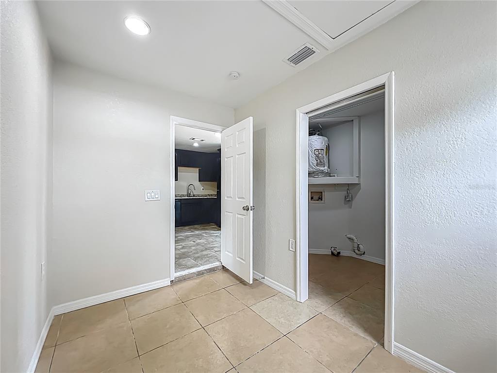 6707 Sierra Terrace New Port Richey, FL 34652 - Photo 26 of 50 wooden floor and closet in a room