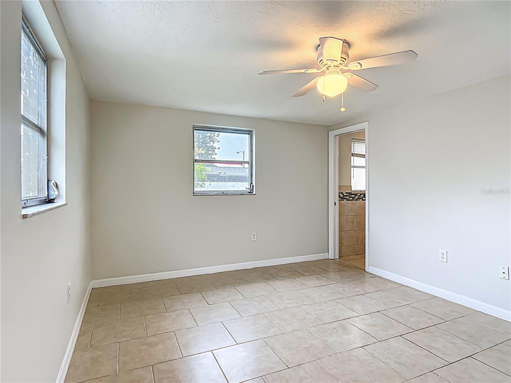 6707 Sierra Terrace New Port Richey, FL 34652 - Photo 30 of 50 a view of an empty room with a window
