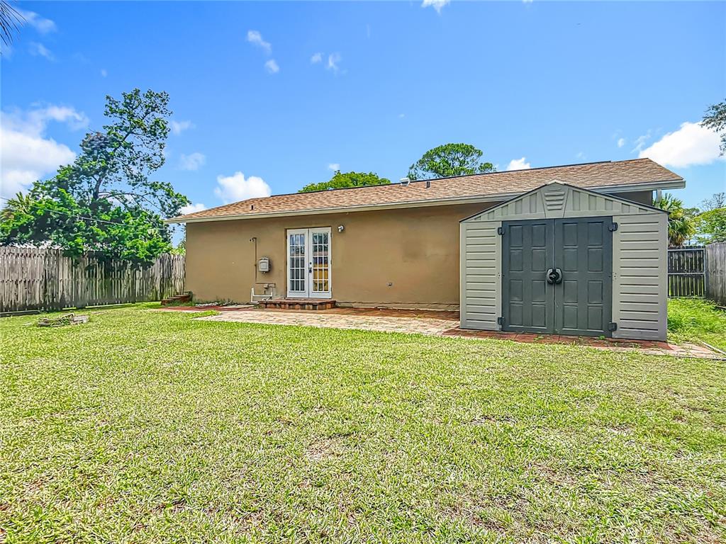 6707 Sierra Terrace New Port Richey, FL 34652 - Photo 39 of 50 a view of a house with a garden