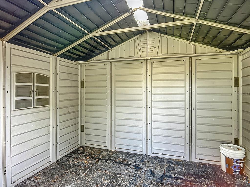 6707 Sierra Terrace New Port Richey, FL 34652 - Photo 40 of 50 a view of a porch with a door