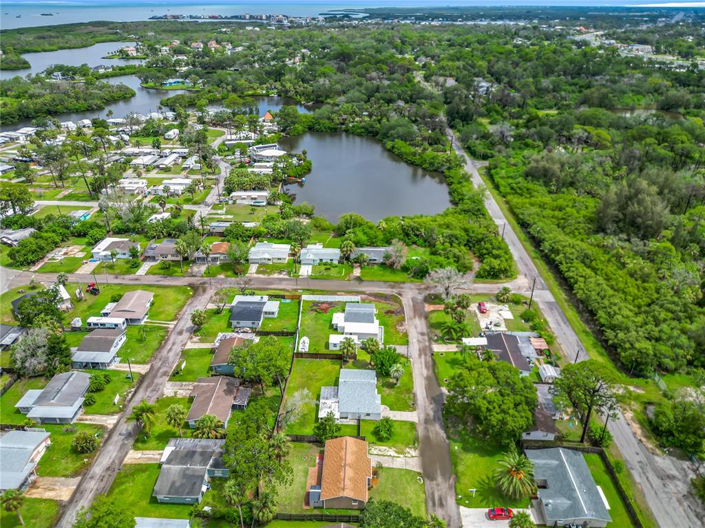 6707 Sierra Terrace New Port Richey, FL 34652 - Photo 49 of 50 an aerial view of residential houses with outdoor space and street view