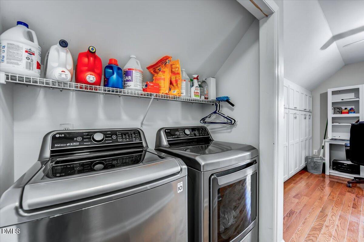 103 Kingsmill Road Cary, NC 27511 - Photo 18 of 30 a utility room with dryer and washer