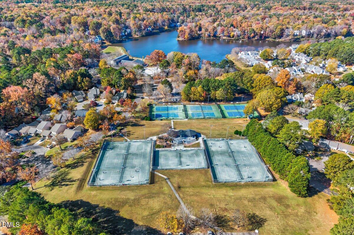 103 Kingsmill Road Cary, NC 27511 - Photo 28 of 30 an aerial view of a house with a yard and lake view in back