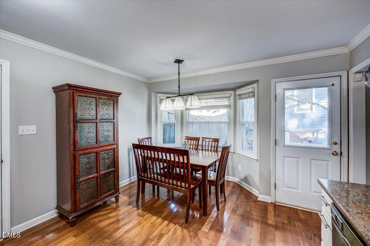 103 Kingsmill Road Cary, NC 27511 - Photo 9 of 30 a dining room with furniture and window