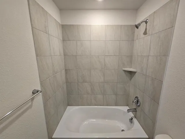 a bathroom with a bathtub