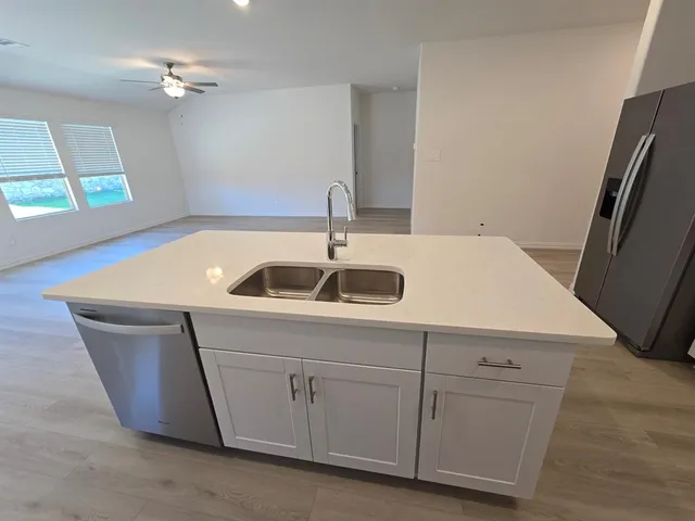 a view of backyard with green space