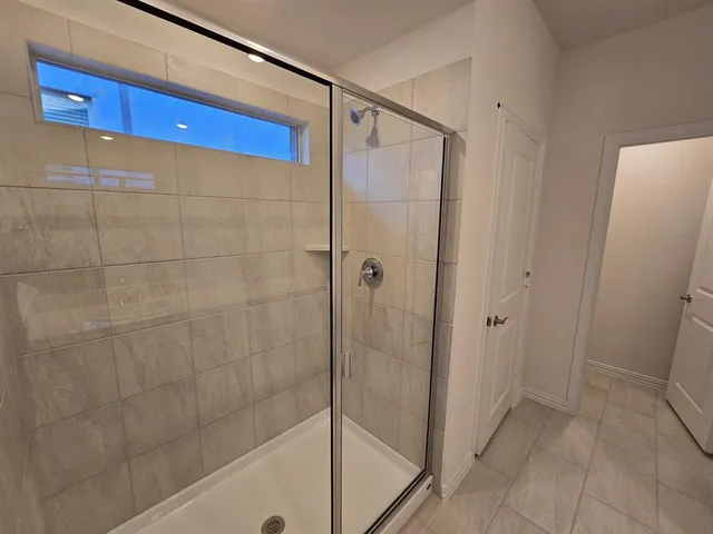 a view of kitchen with cabinets and wooden floor