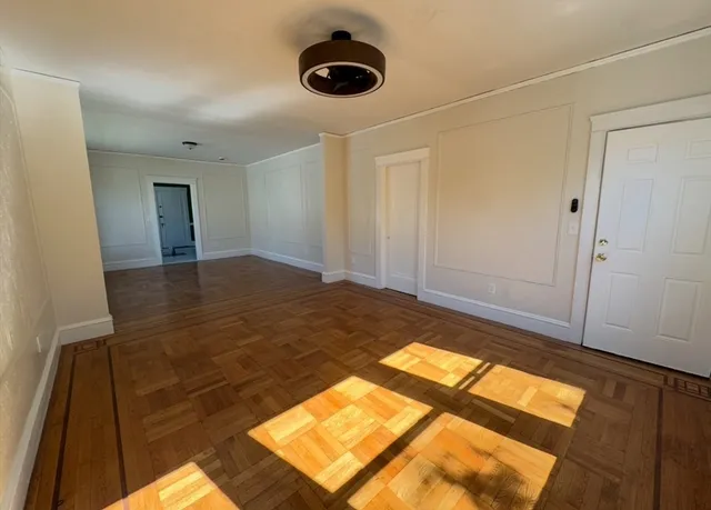 a view of an empty room and window