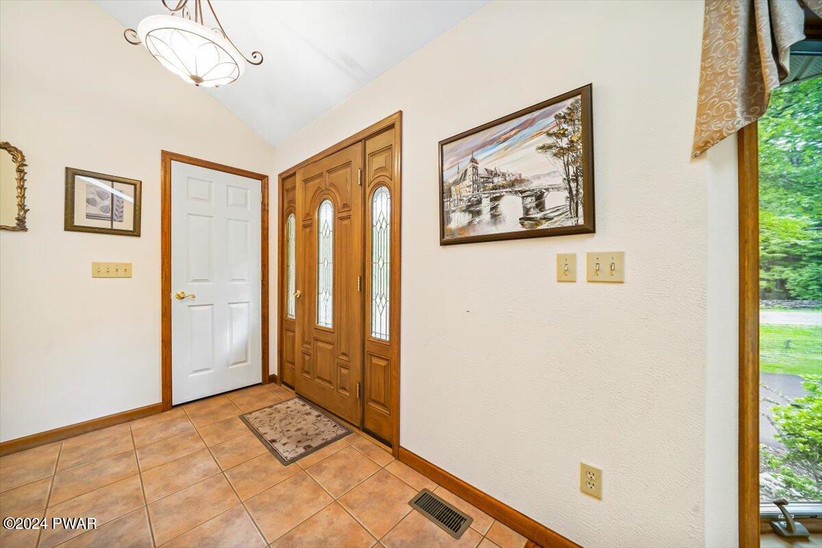 305 Maple Ridge Drive Hawley, PA 18428 - Photo 6 of 36 foyer