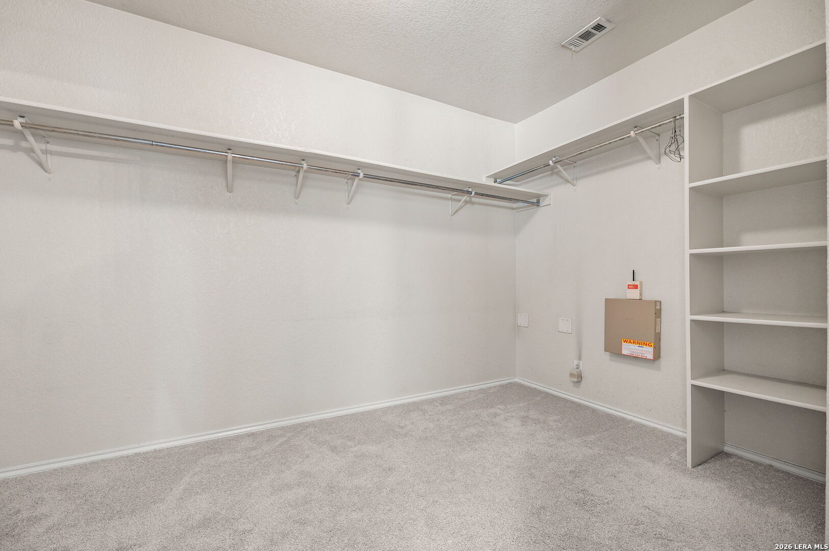 7207 Avery Road Live Oak, TX 78233 - Photo 29 of 32 a view of an empty walk in closet
