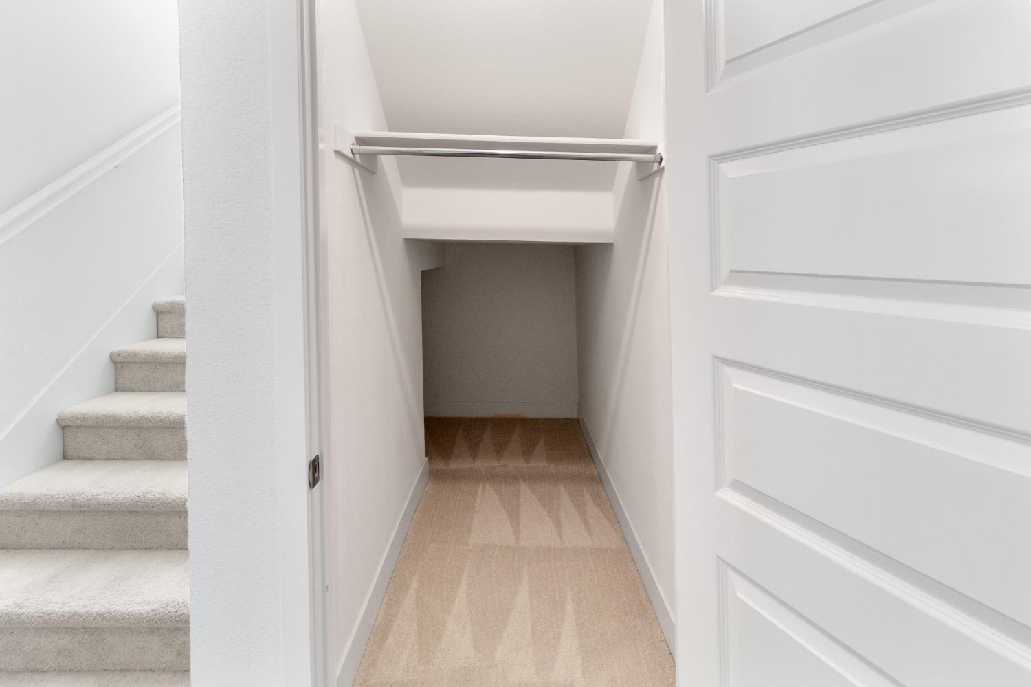 4263 Orpheus Circle Rancho Cordova, CA 95742 - Photo 26 of 51 a view of a hallway with wooden floor and staircase