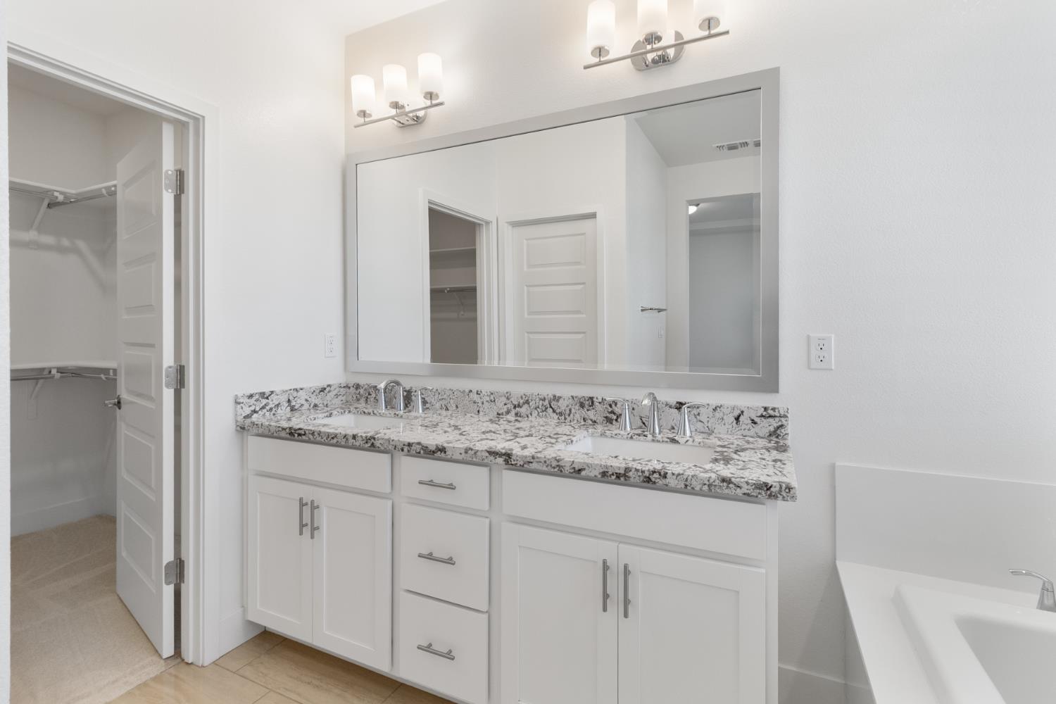 4263 Orpheus Circle Rancho Cordova, CA 95742 - Photo 37 of 51 a bathroom with a sink and a mirror