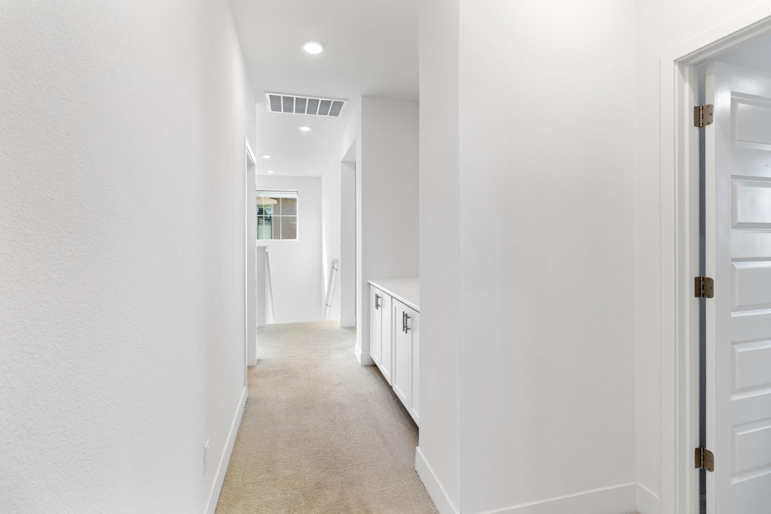4263 Orpheus Circle Rancho Cordova, CA 95742 - Photo 41 of 51 a view of a hallway with a white walls