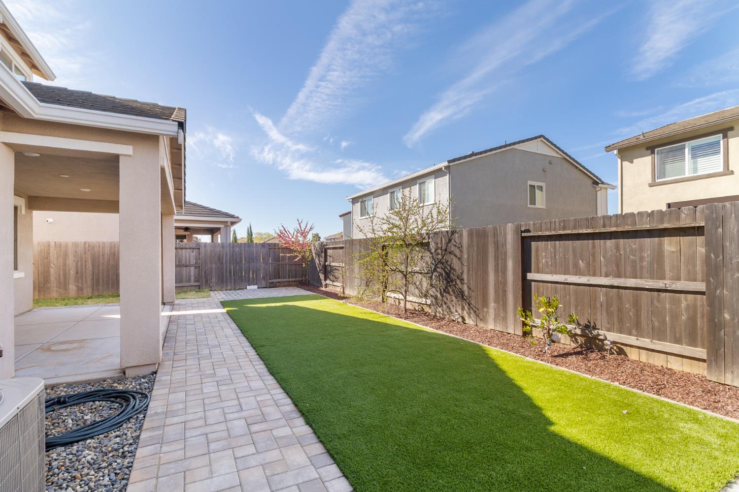 4263 Orpheus Circle Rancho Cordova, CA 95742 - Photo 49 of 51 a view of a house with a yard