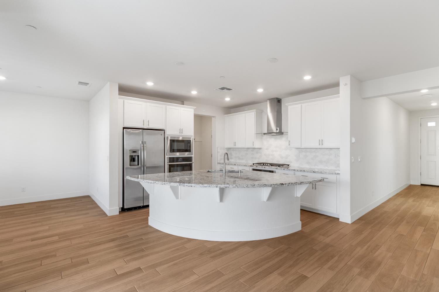 4263 Orpheus Circle Rancho Cordova, CA 95742 - Photo 8 of 51 a kitchen with stainless steel appliances a refrigerator a stove top oven and white walls