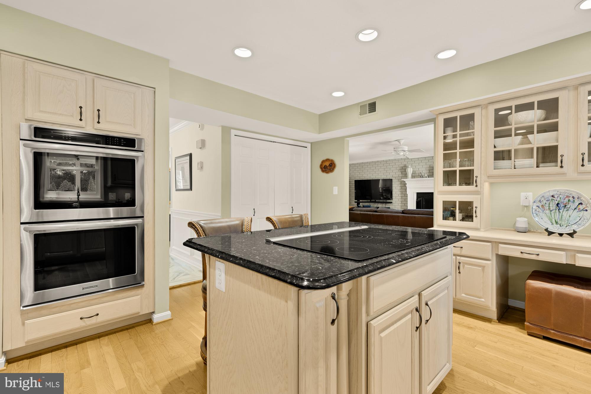 5117 Pheasant Ridge Road Fairfax, VA 22030 - Photo 16 of 59 a kitchen with stainless steel appliances granite countertop a stove and a sink