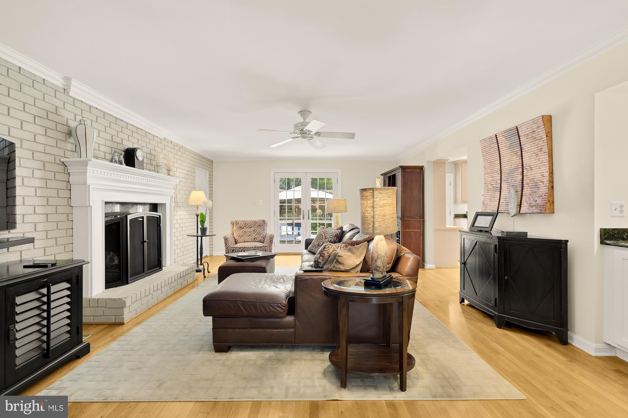 5117 Pheasant Ridge Road Fairfax, VA 22030 - Photo 17 of 59 a living room with furniture fireplace and flat screen tv