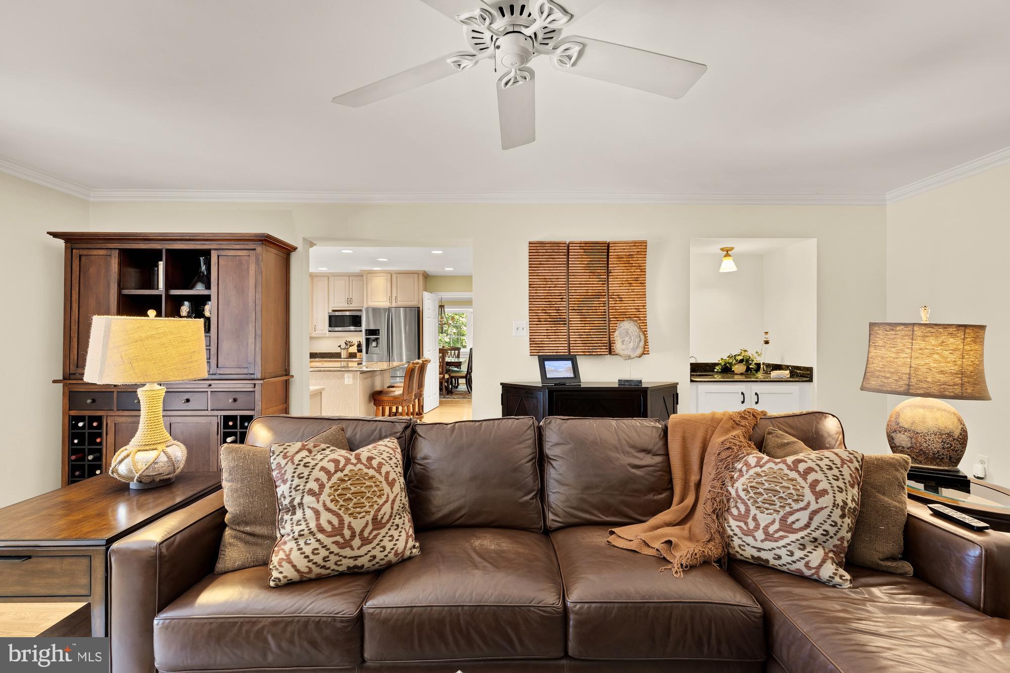 5117 Pheasant Ridge Road Fairfax, VA 22030 - Photo 21 of 59 a living room with furniture or couch and a chandelier