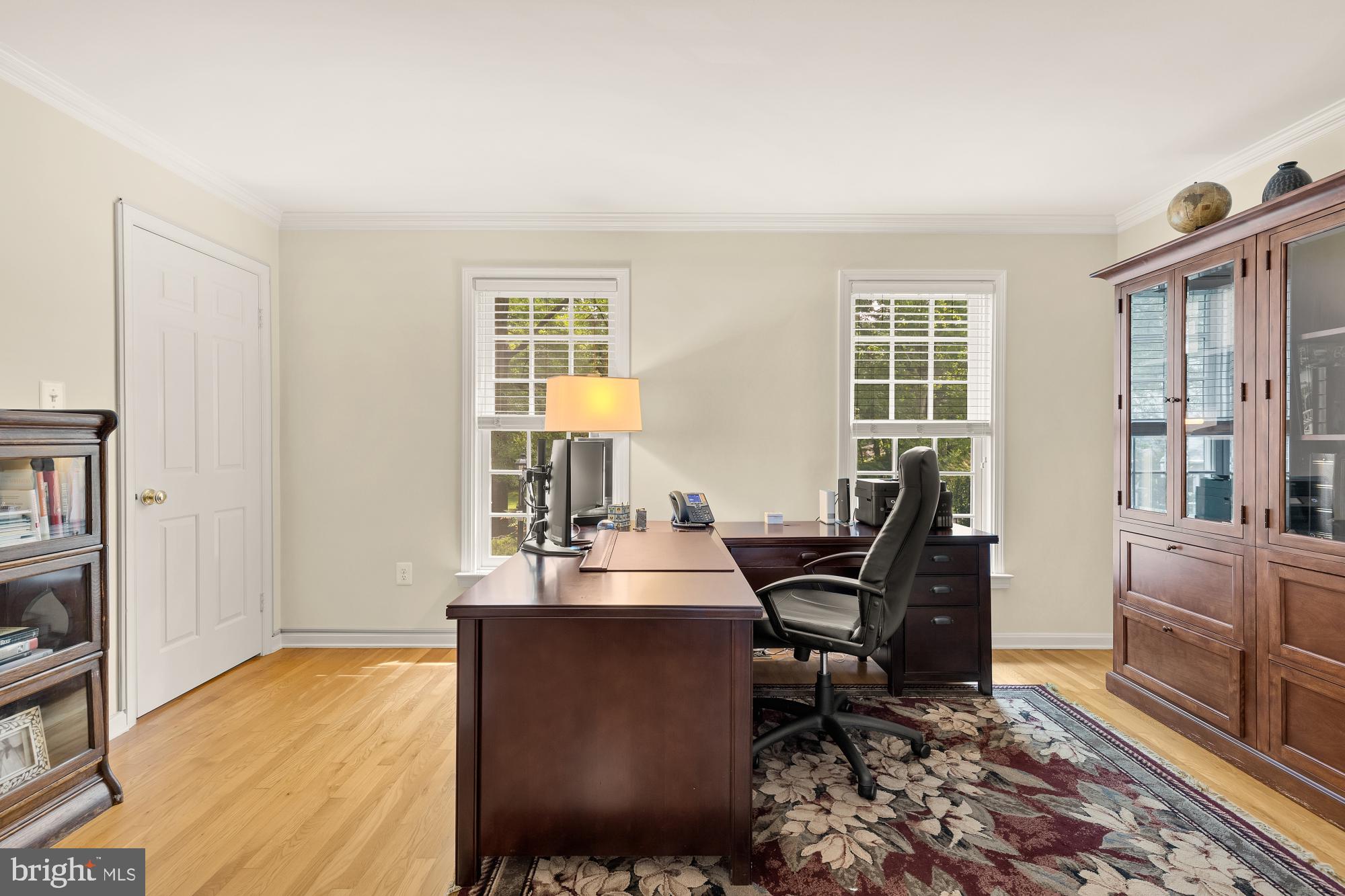 5117 Pheasant Ridge Road Fairfax, VA 22030 - Photo 23 of 59 a view of a workspace with furniture and a window