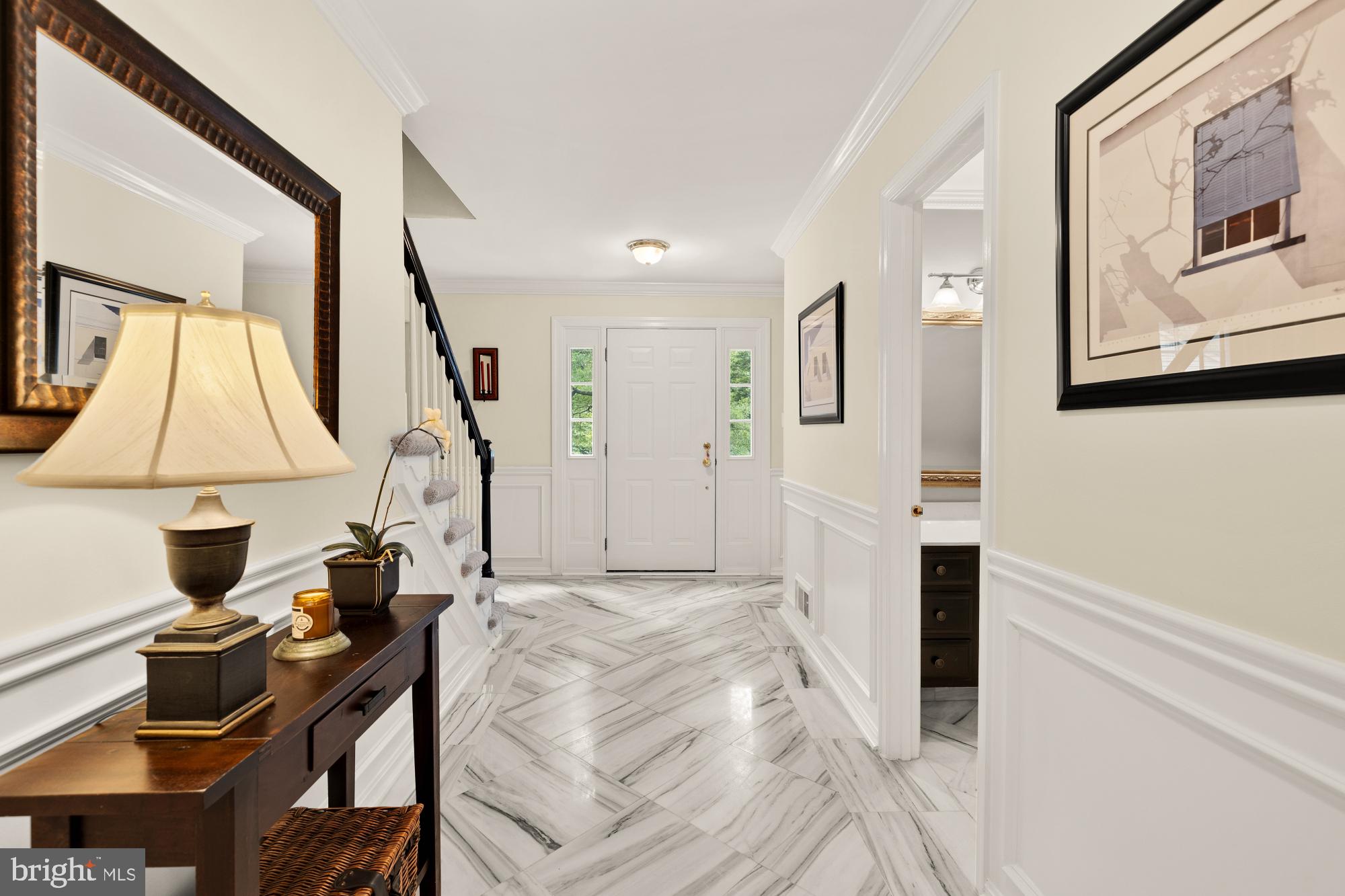 5117 Pheasant Ridge Road Fairfax, VA 22030 - Photo 26 of 59 a bed room with a bed and a flat screen tv