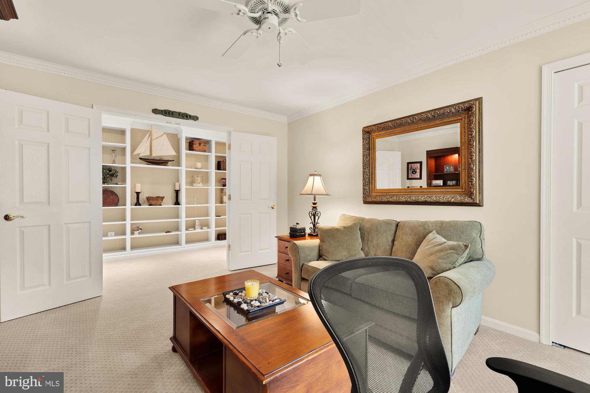 5117 Pheasant Ridge Road Fairfax, VA 22030 - Photo 40 of 59 a living room with furniture and a window