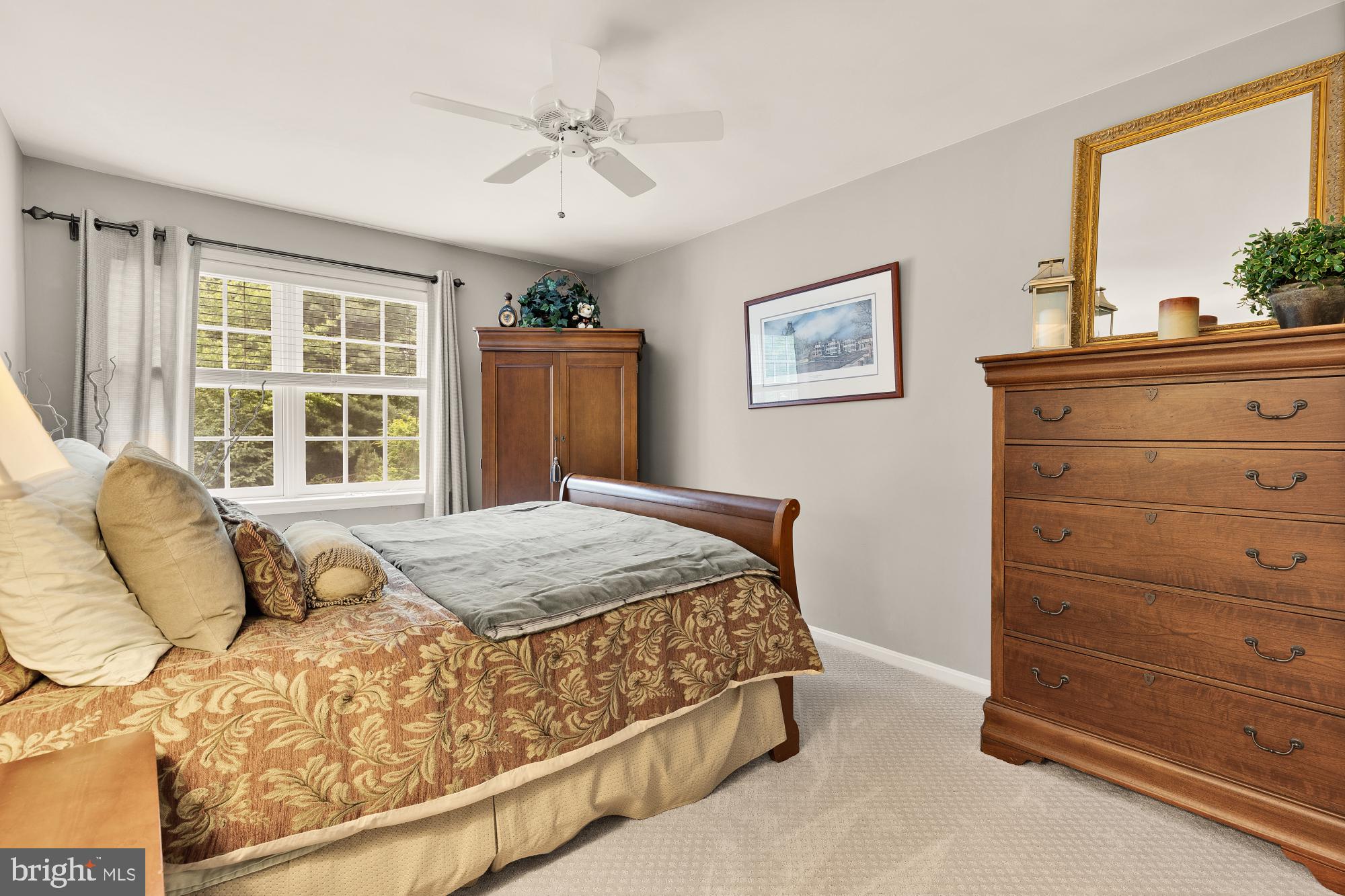 5117 Pheasant Ridge Road Fairfax, VA 22030 - Photo 41 of 59 a bedroom with a bed and a window