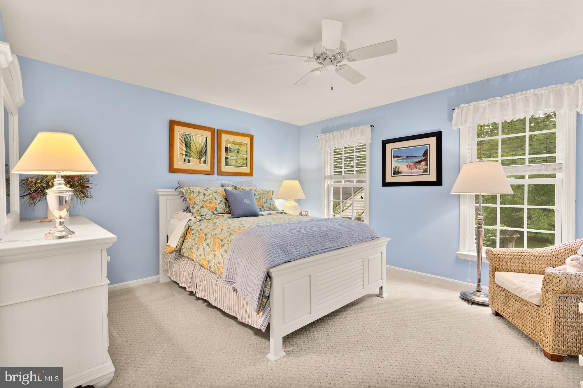 5117 Pheasant Ridge Road Fairfax, VA 22030 - Photo 44 of 59 a spacious bedroom with a bed and a couch