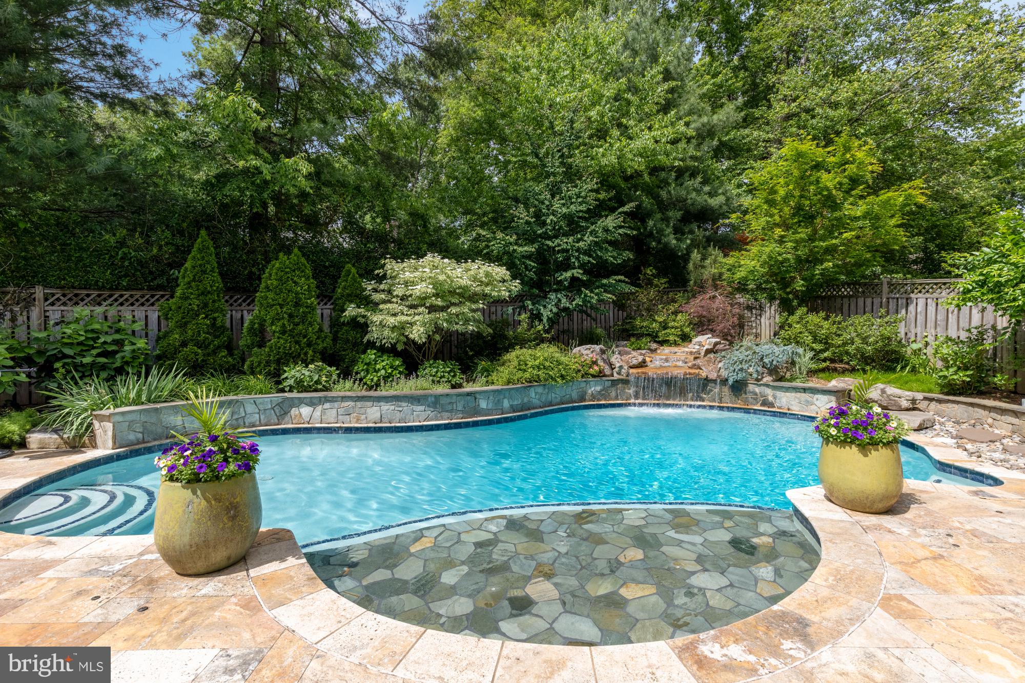 5117 Pheasant Ridge Road Fairfax, VA 22030 - Photo 54 of 59 a view of a swimming pool with a sitting space