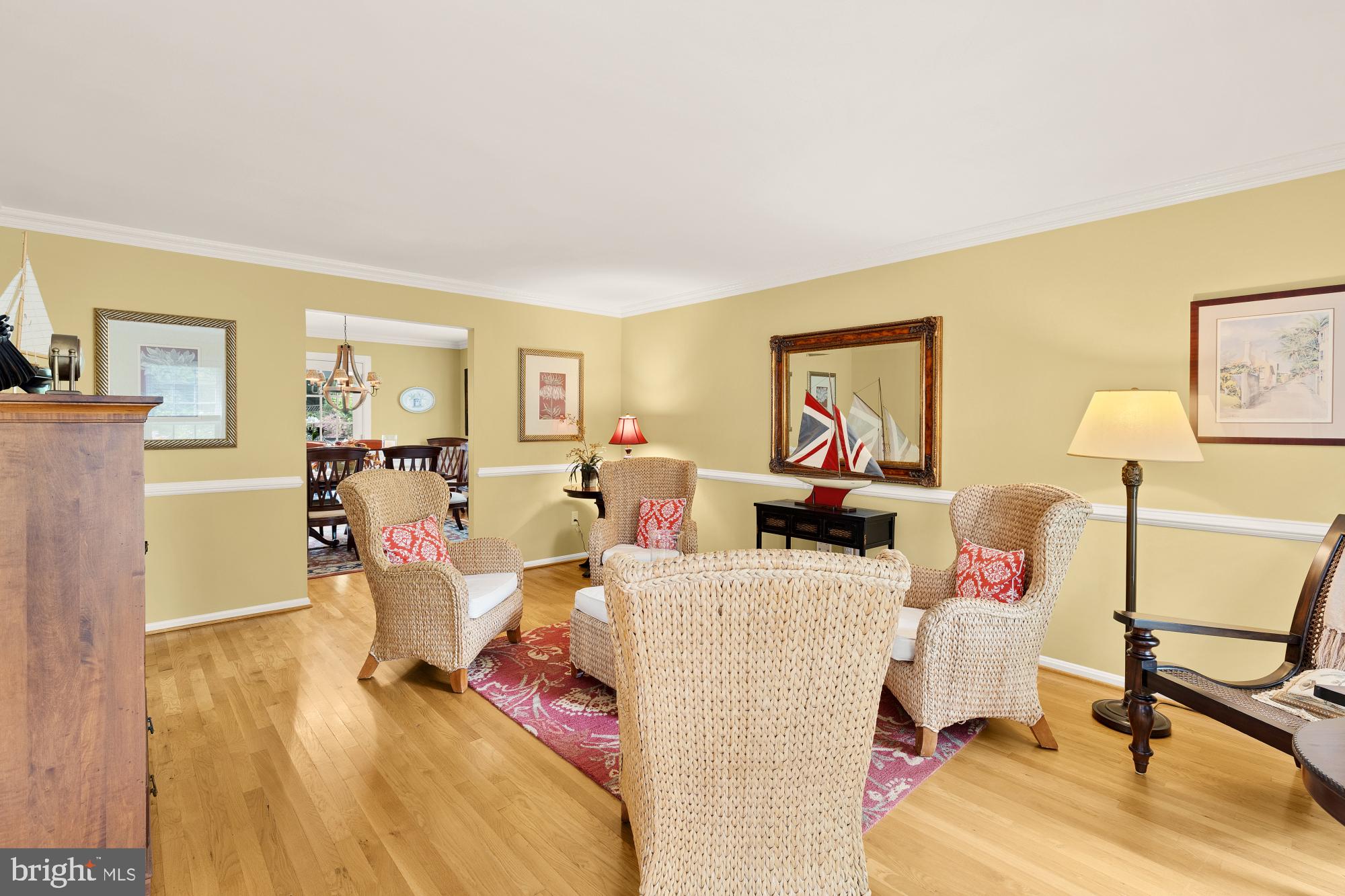 5117 Pheasant Ridge Road Fairfax, VA 22030 - Photo 6 of 59 a living room with furniture and a flat screen tv