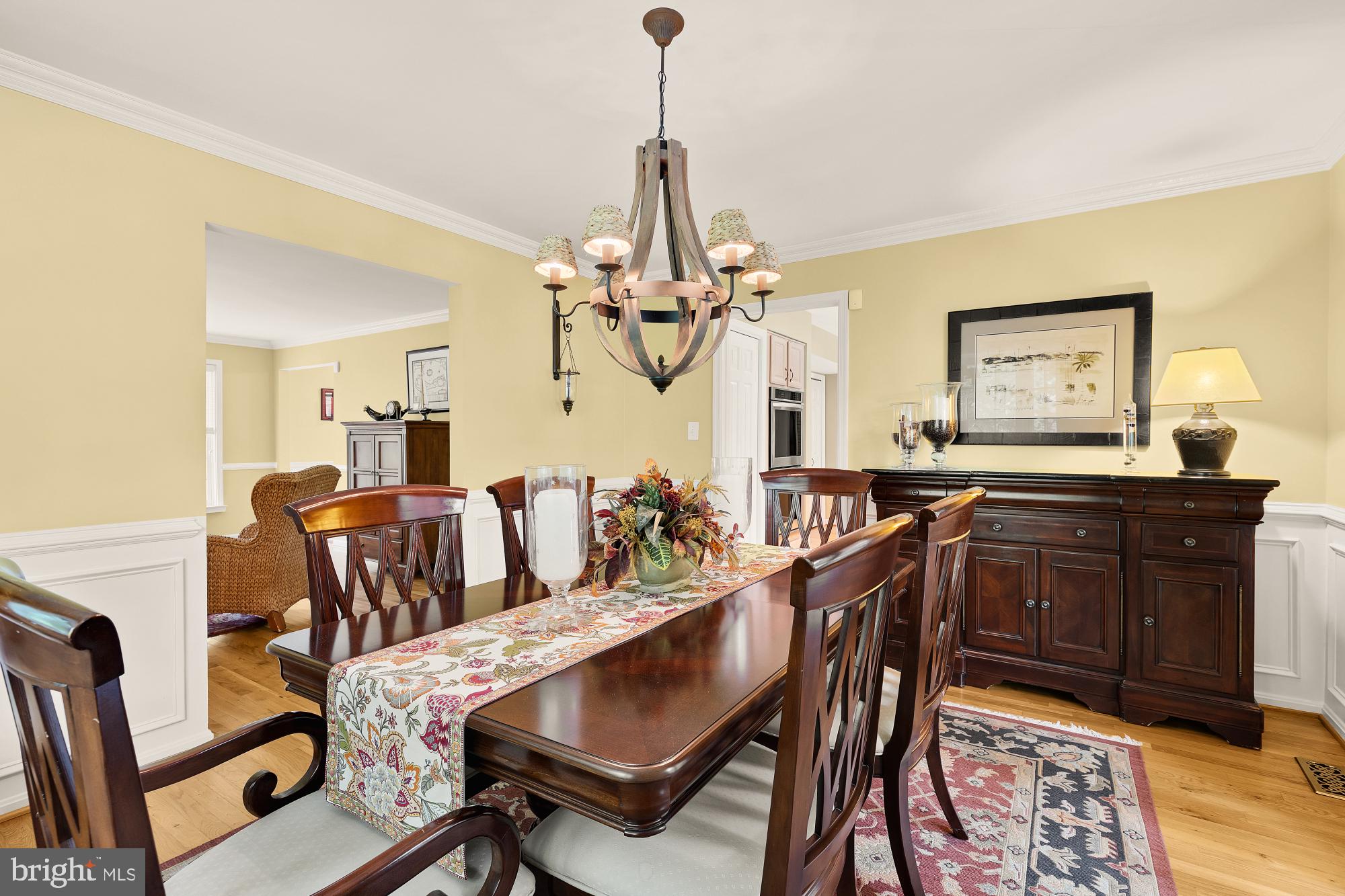5117 Pheasant Ridge Road Fairfax, VA 22030 - Photo 9 of 59 a view of a dining room with furniture and chandelier