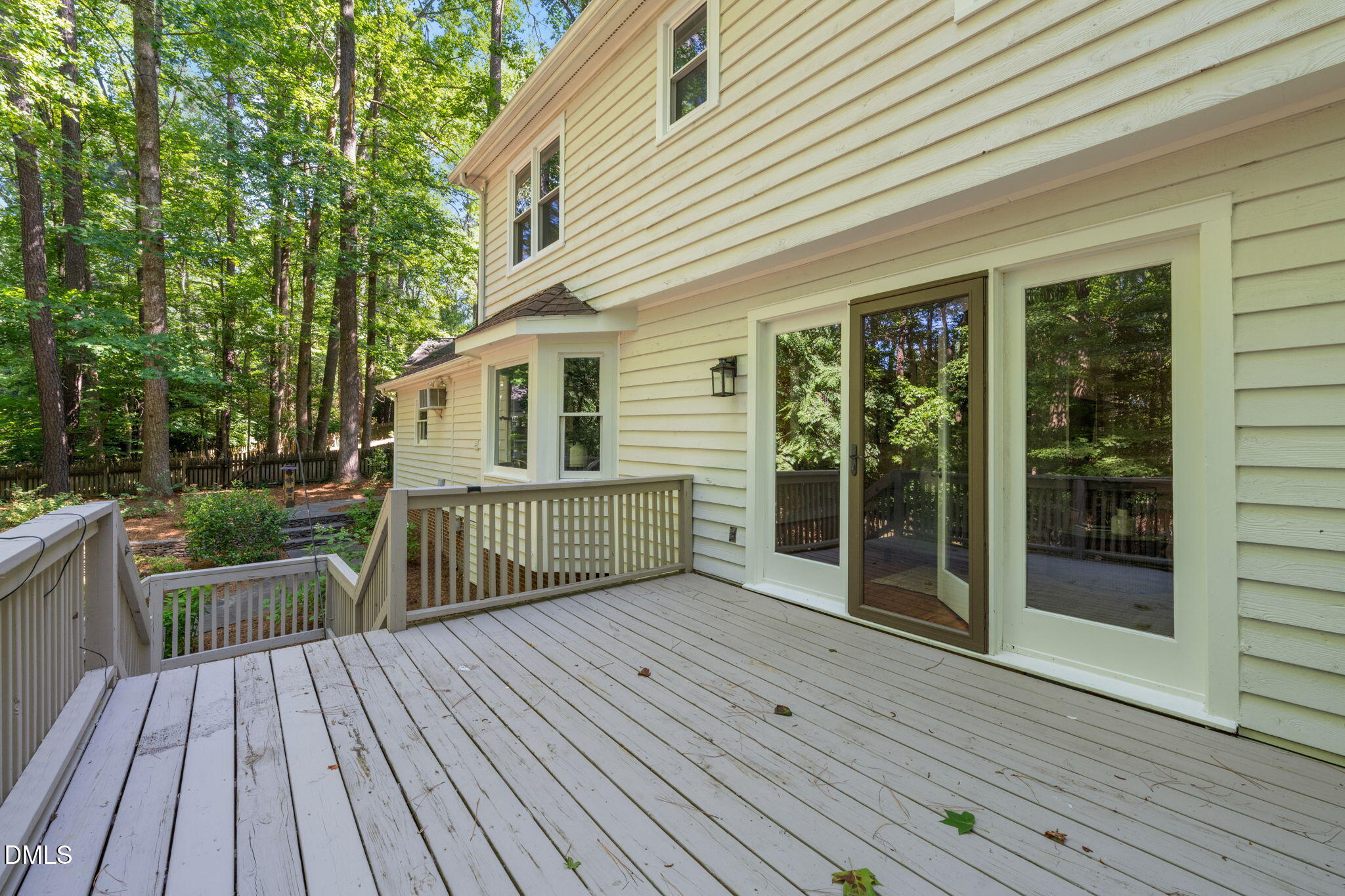 18 Strawberry Ridge Lane Durham, NC 27713 - Photo 40 of 59 a view of backyard with deck and outdoor seating