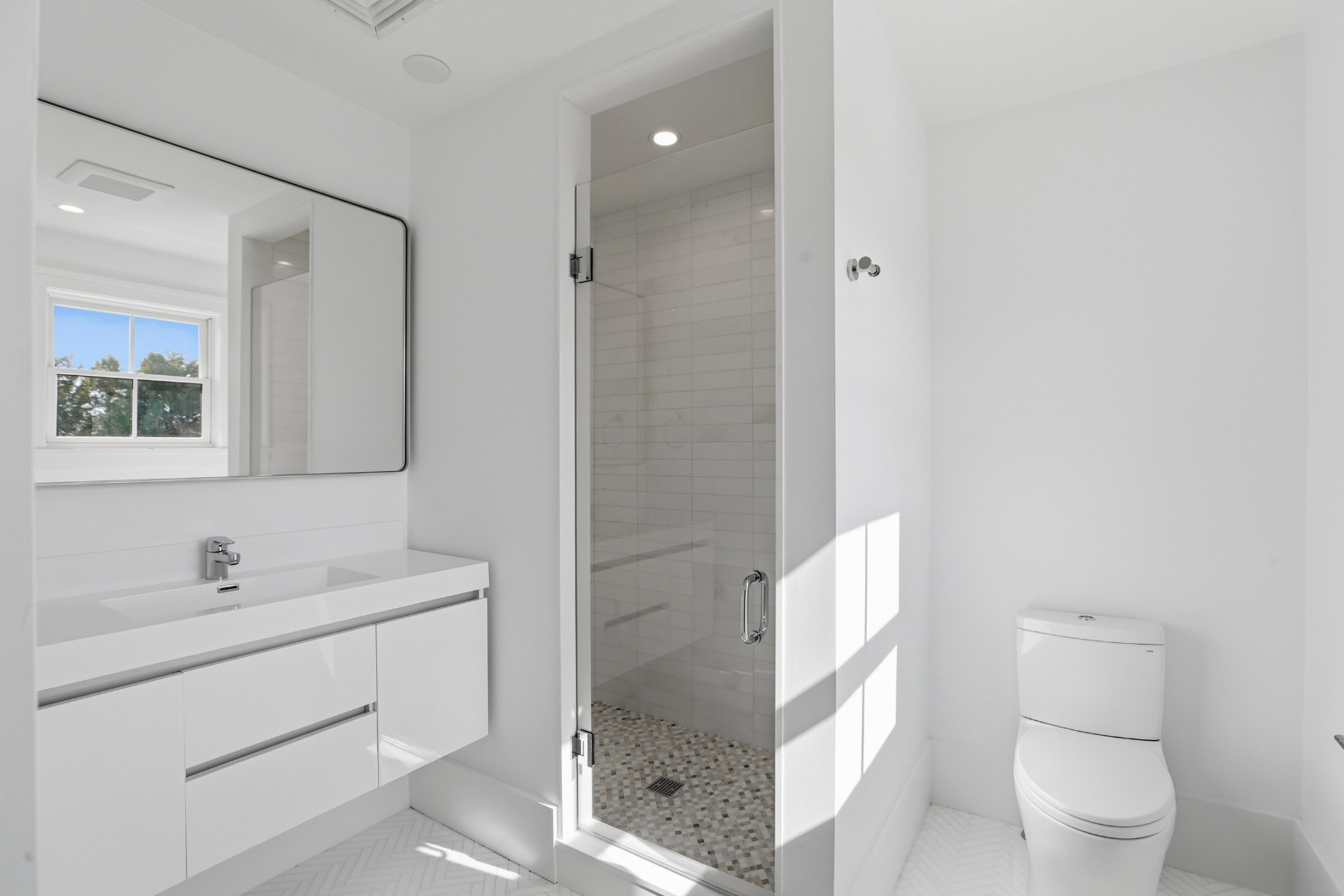 10 Rudder Lane Nantucket, MA 02554 - Photo 23 of 33 a bathroom with a toilet sink and shower