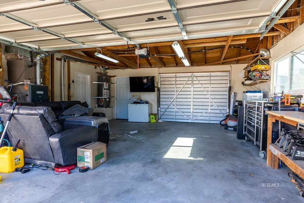 538 North Rio Bravo Street Ridgecrest, CA 93555 - Photo 43 of 45 a living room with furniture and a window