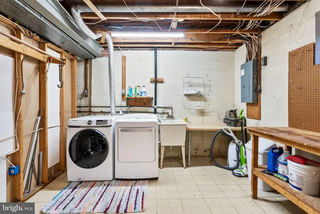 a utility room with dryer and washer