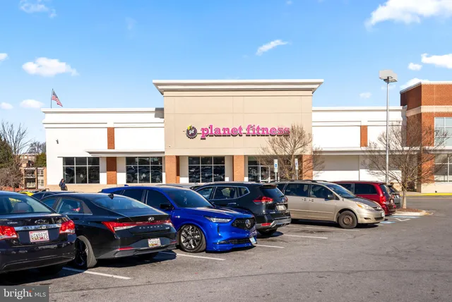 a car parked in front of a building