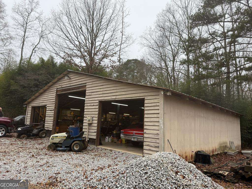1837 Whooping Creek Road Carrollton, GA 30116 - Photo 13 of 19 a view of a car park in front of a house